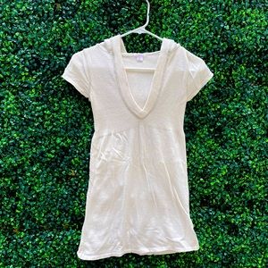 Short-sleeve hooded sweater. Cut flattering on chest and forgiving to stomach.